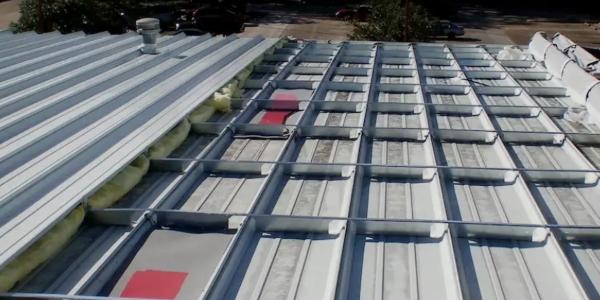 Weighing the roof: Choosing the right retrofit for aging metal roofs