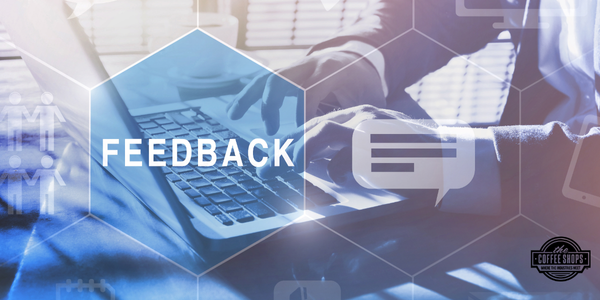 Image of a person typing on a computer overlayed with a blue layer and text saying feedback"