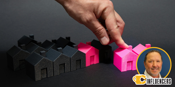 Image of a hand moving a pink house miniature. In the background are similar houses in black. Shawn’s headshot is overlayed i