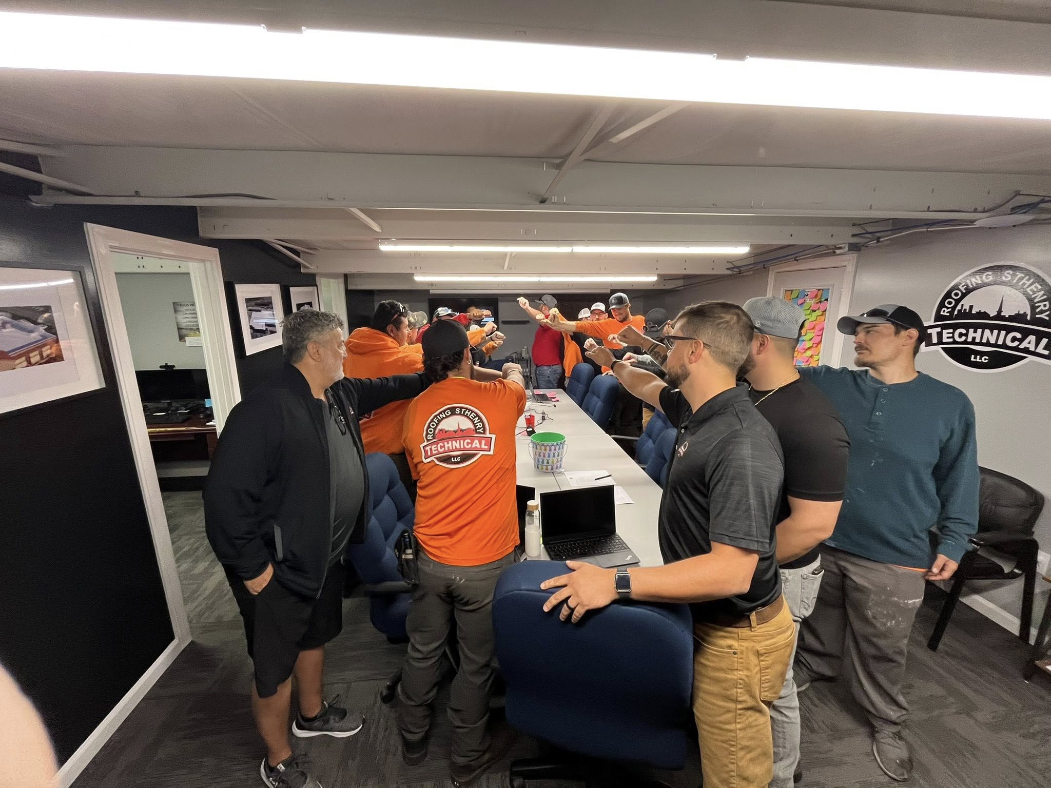 team hands in celebration
