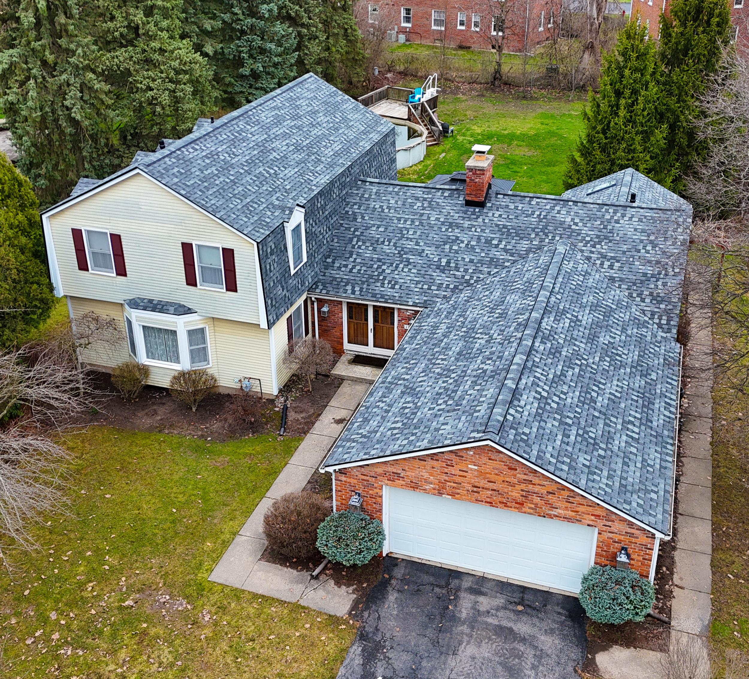 Stellar Roofing - grey shingle